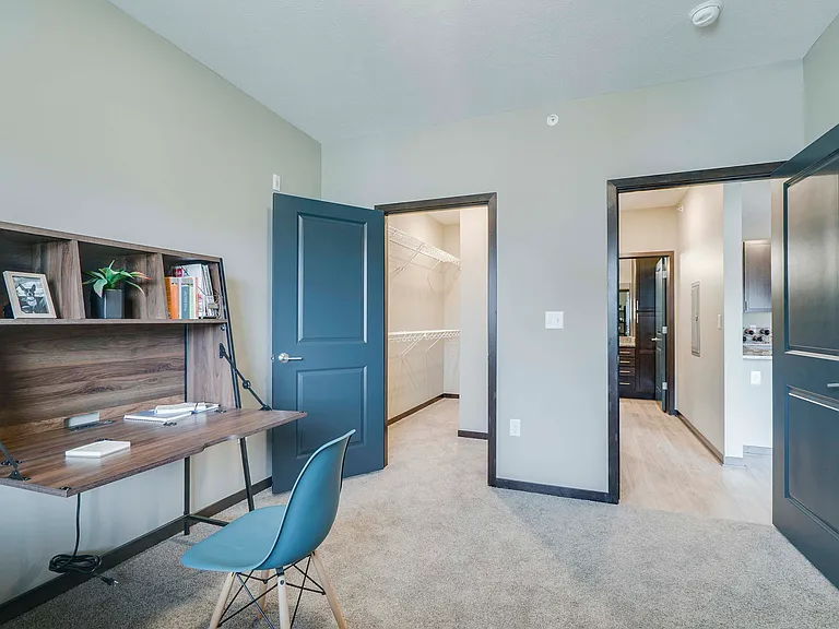 Set up a productive workspace in a dedicated office area, ideal for working from home.