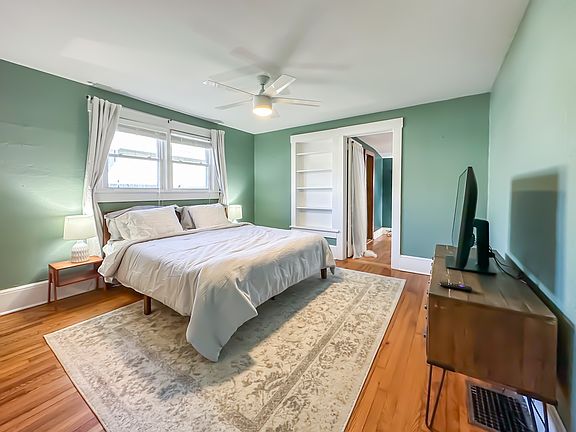 Built-in shelves and doorway to adjoining office space