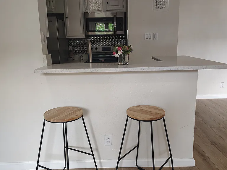Bar area with capacity for 4 chairs!