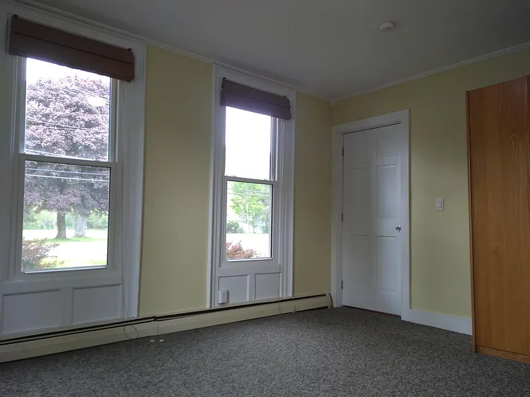 Front bedroom showing door from center hall.