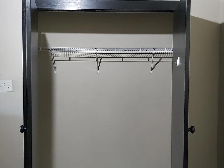 Close up of closet (same size available in upstairs bedroom)