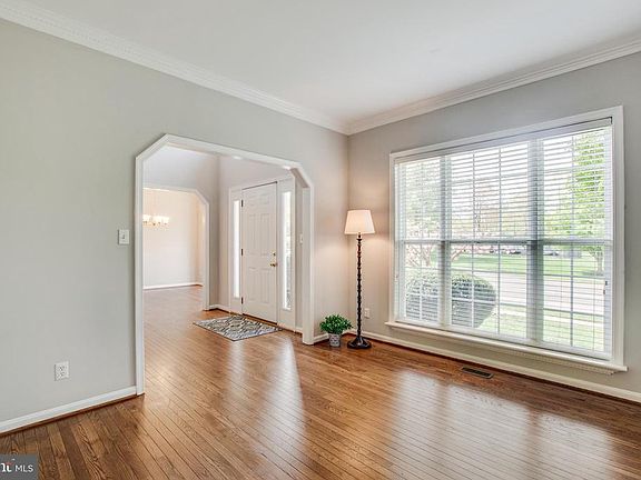 Formal living room with hardwood floors