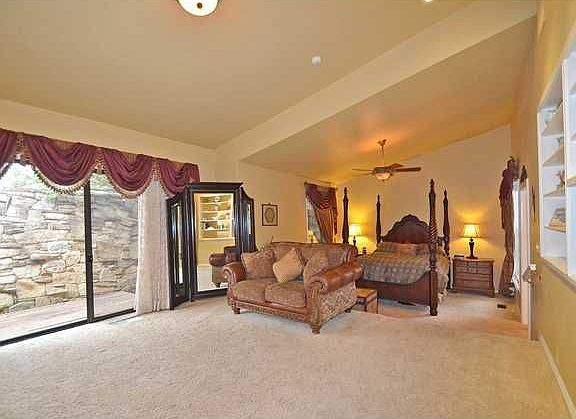 Large Master Bedroom with sitting area and Fireplace