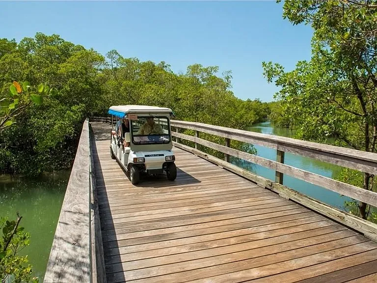 Tram and boardwalk to the private Clam Pass Beach, just .3 miles