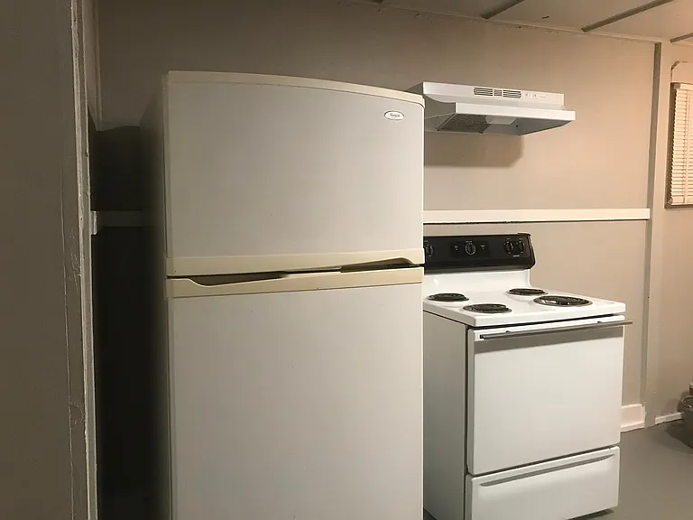 Refrigerator and stove included.