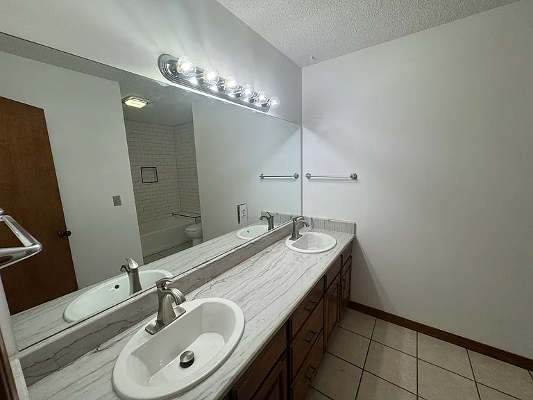 2nd Story full bathroom with double sinks