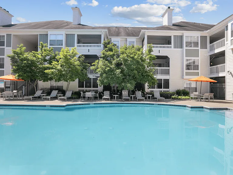 Resort-style pool with sun deck at The Crossings at Russett in Laurel, MD