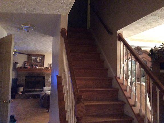 Stairs as you walk in the fr