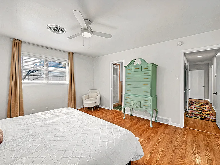 Spacious primary suite with king bed and secure coded entry.