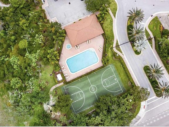 Pool, jacuzzi, baseball court & play ground