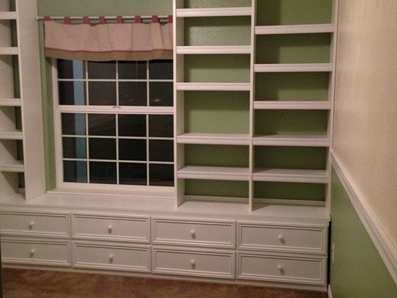 Built in book shelves and extra storage