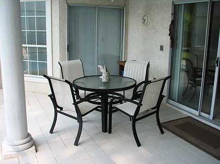 screened porch opens to pool 