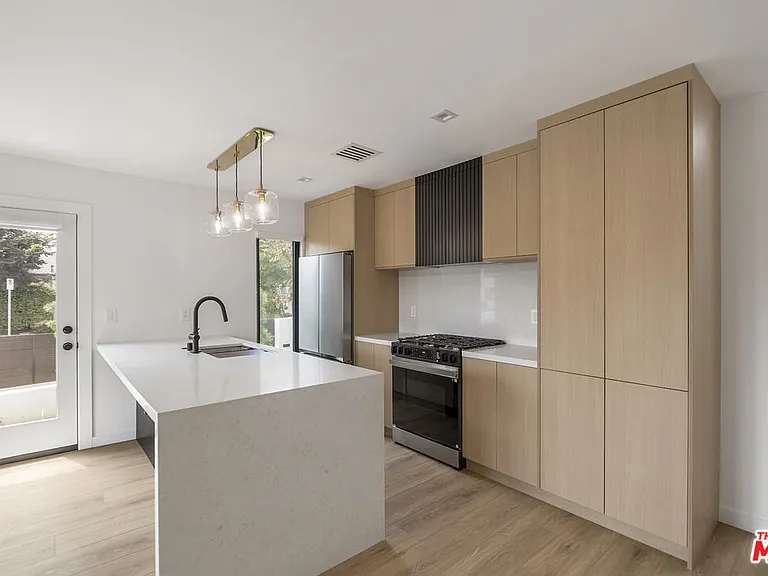 1265 Keniston Ave — Photo 6