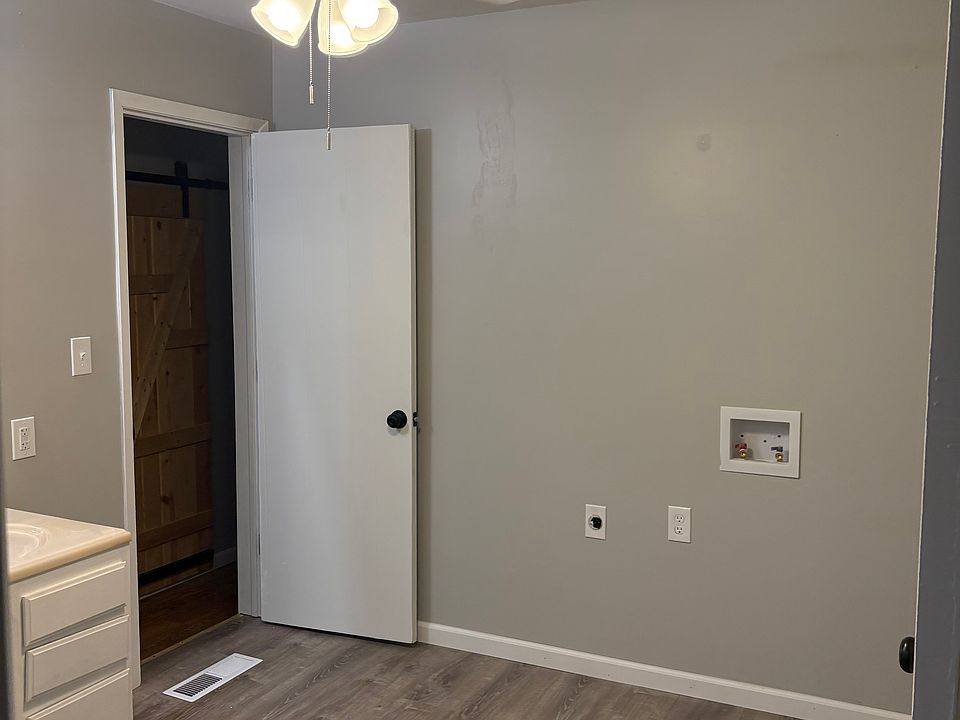 bathroom with washer, dryer hook ups