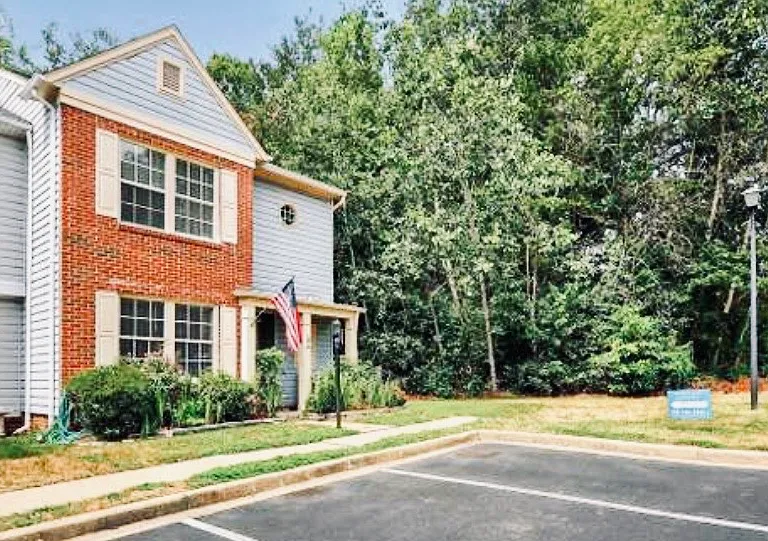 Front of the property. Enjoy the convenience of two assigned parking spaces right outside your front door.