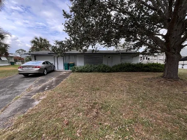 9853 Honeysuckle Dr, Micco, FL 32976