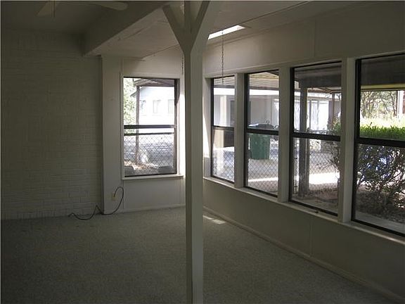 Enclosed Porch - light, bright and concrete floors