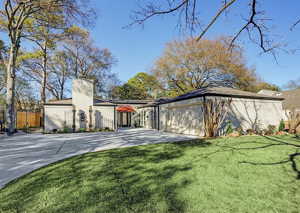 Welcome to 10202 BRIAR FOREST IN BRIARGROVE PARK! Surrounded by Majestic Trees and Prestigious Wrought Iron Gates, this Eye-Catching Beauty Holds Many Surprises Inside..... Completely Remodeled - Everything Is New - Come In And See All The Exquisite 