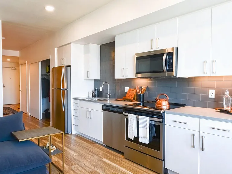Stainless steel Whirlpool appliances with glass cooktop