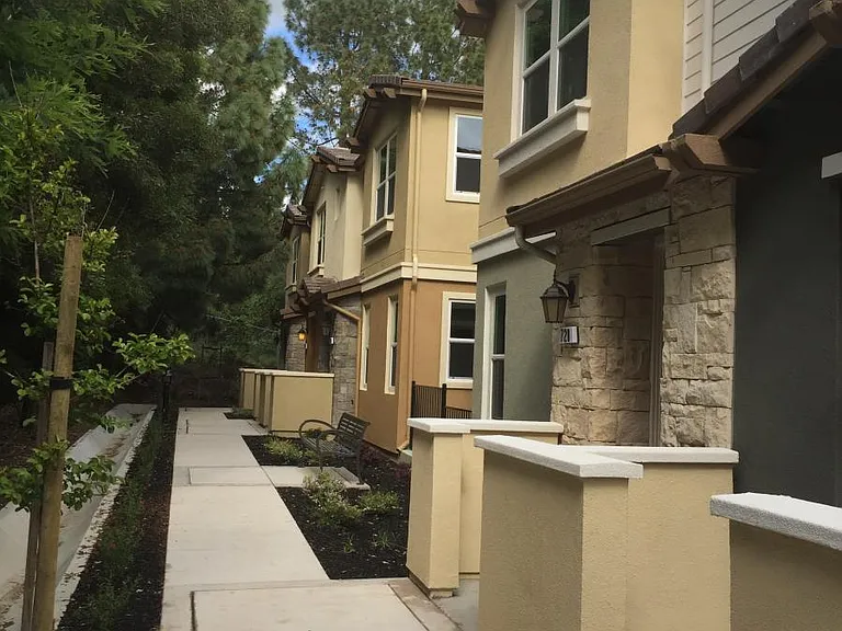 End unit lane Front door facing beautiful landscape