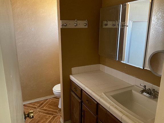 Master Bathroom (Sink, Toilet and walk in Shower