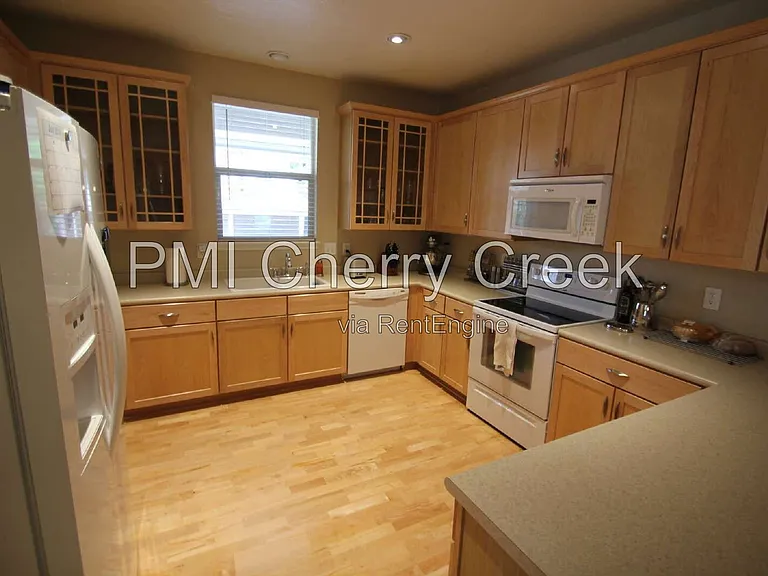 6385 S Xanadu Way — Photo 3