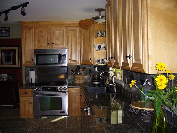 maple cabinets, granite tops