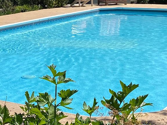 Outdoor pool located right next to your building