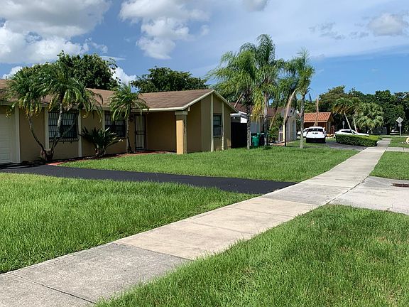 This is the fourth photograph capturing the front exterior of the subject property.