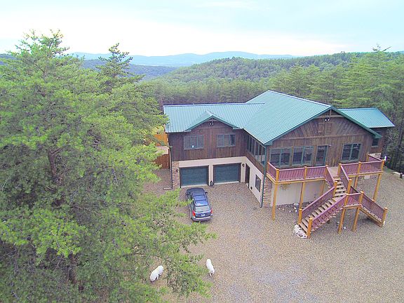 Aerial view of home and mtns