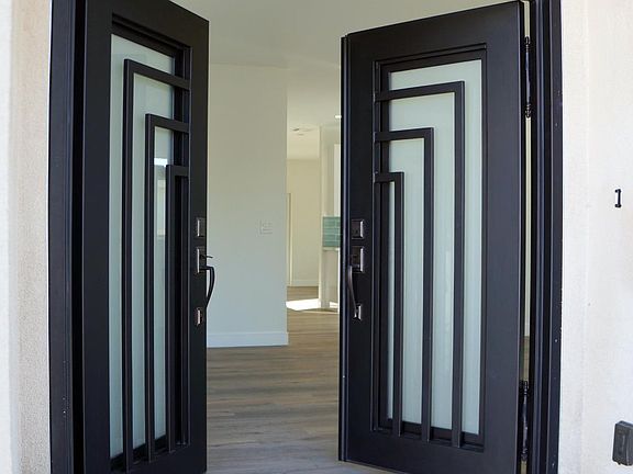 Double iron entry doors
