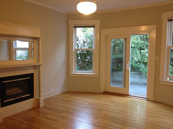 Living Room w/ Access to Large Private Yard