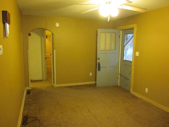 Living room looking to front door