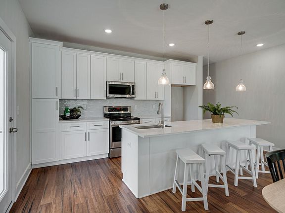 Beautiful new construction homes with abundant storage space - modern cabinets spacious kitchen