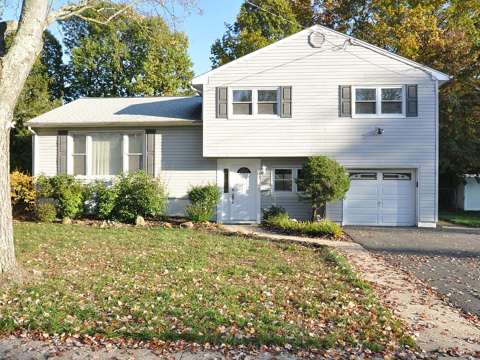 Single Family Split Level - On a quiet tree-lined street with no thur-traffic