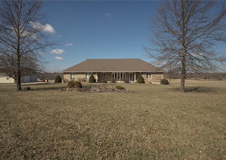 26516 South Freedom Road, Harrisonville, MO 64701     Custom built ranch style home with HUGE ROOMS!