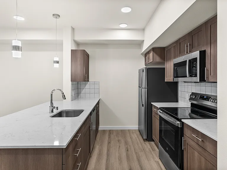 Contemporary kitchen with sleek finishes. Contemporary kitchen with sleek finishes.