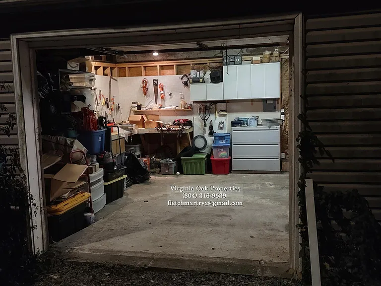 Garage with workshop area and storage