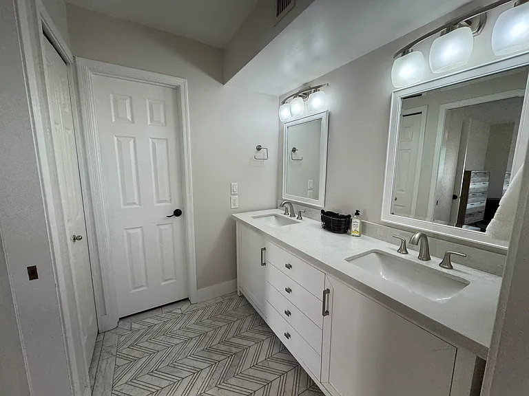 Primary Bath - Walk in closet ahead, linen closet on left