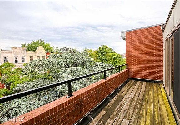 215-E-NE-front-balcony-w