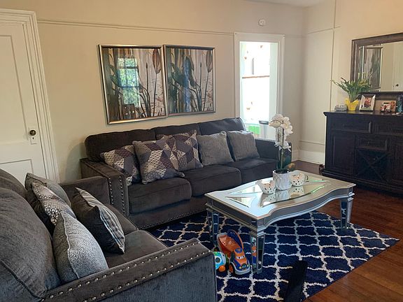 Living Room - lots of light with 3 large windows