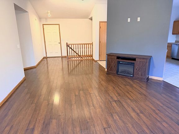 Living Room and Entry way. Fireplace is not included.