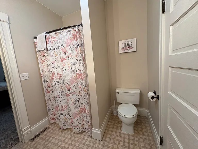 Jack & Jill bathroom located between the two bedrooms. Has shower, but no bathtub.