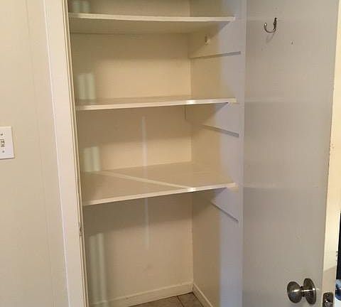 Full pantry off kitchen offers ample storage.