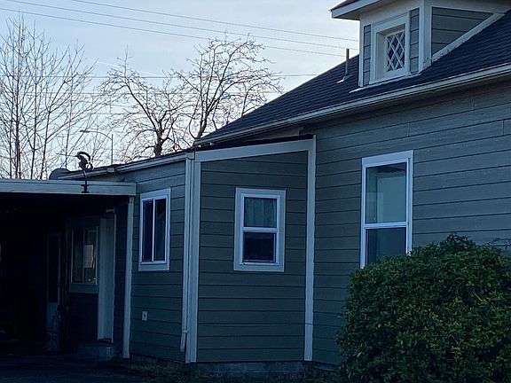 left side of house with carport