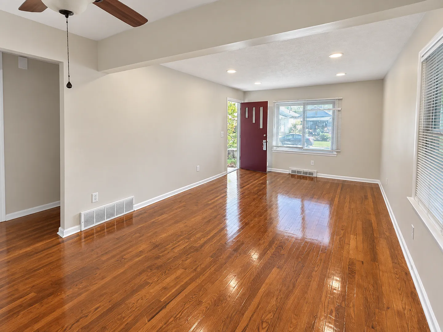 Charming 3BR Home with Full Basement, Hardwood Floors & Carport — Photo 2