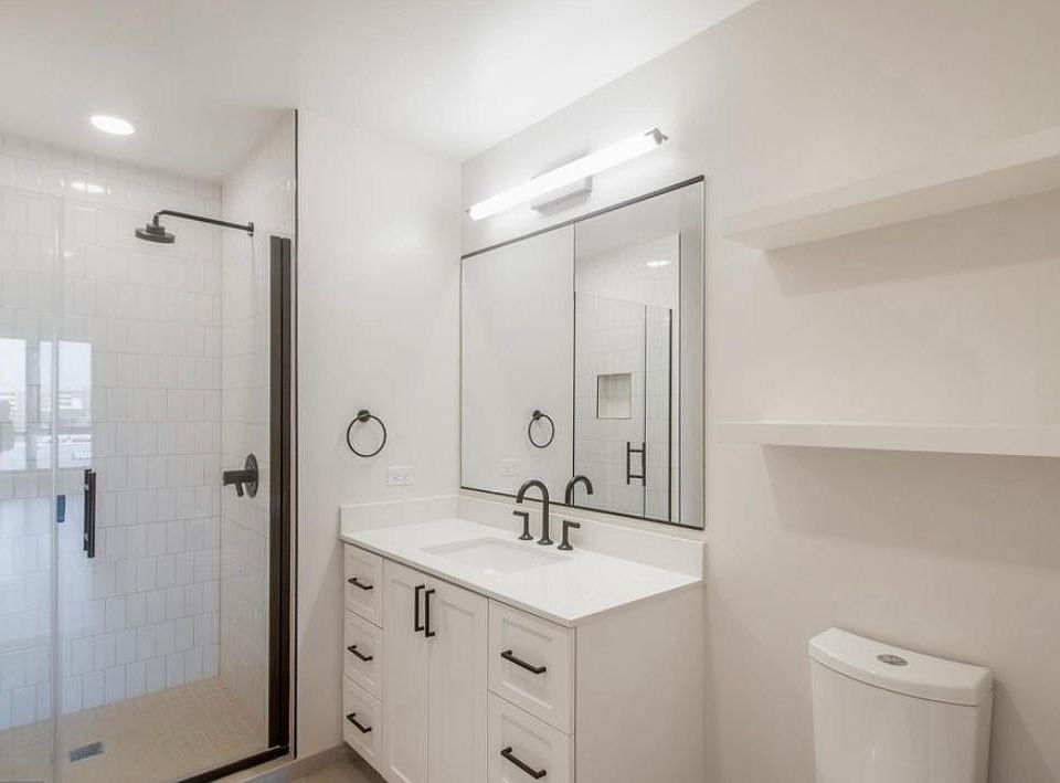 Walk in shower in large bathroom