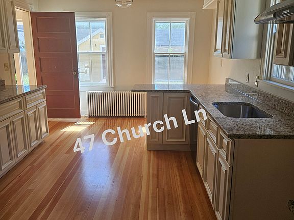 Brand new kitchen with appliances (refrigerator, oven, dishwasher); new flooring