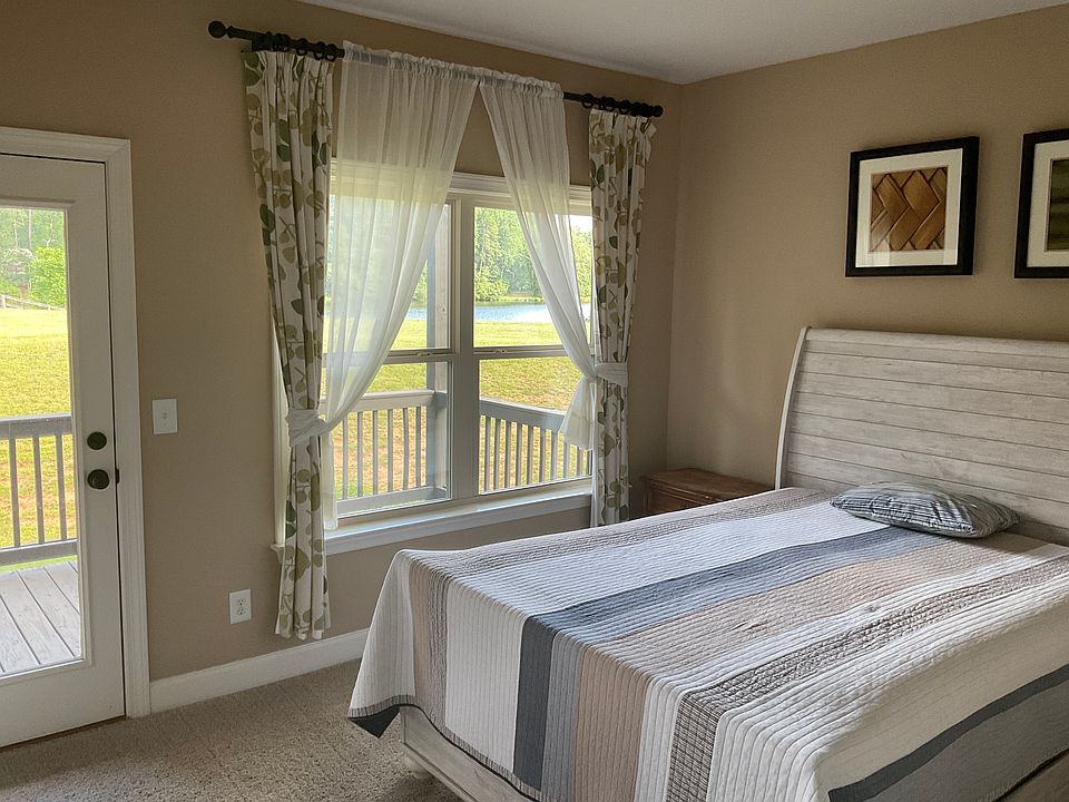 Main level room available with balcony overlooking the lake and private full restroom and walking closet.