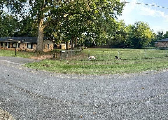 Front w/Large fenced yard